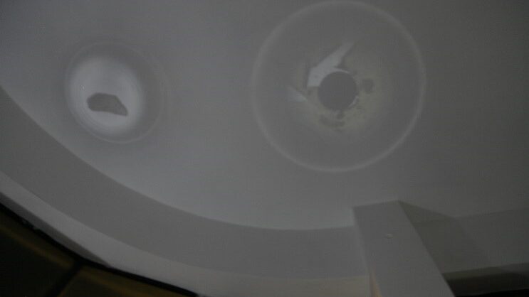 Magnified projections of the site-specific materials on the ceiling