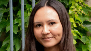 Portrait image of Alix. A woman looking at the camera